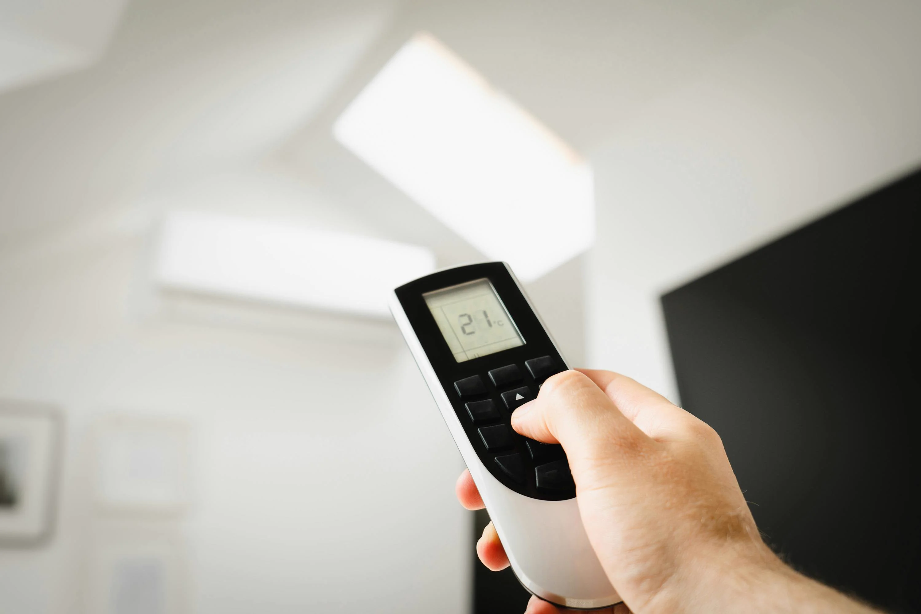 Télécommande de thermopompe réglée à 21 °C